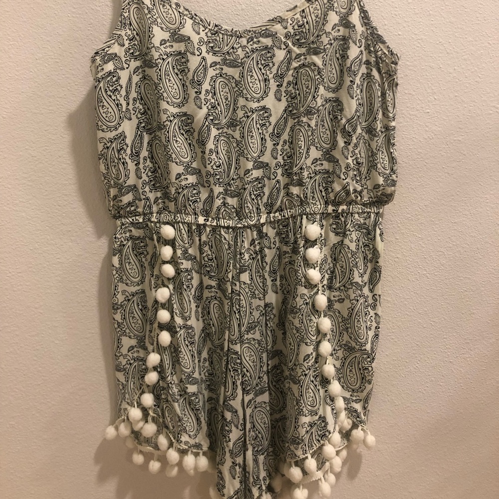 A super cute embellished romper or cover up!!
